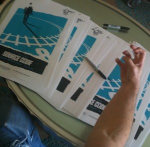 Duncan Jones Signs Olly Moss Source Code Posters LA March 18th 2011